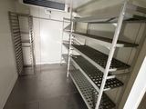 a room with shelves and shelves in it that are empty