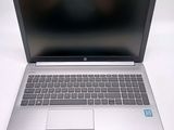 a laptop computer that is sitting on a table