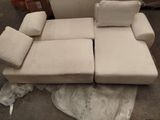 a couch that is sitting on the floor in a room