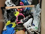 a cardboard box filled with assorted items in it