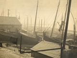 many boats that are docked in the water