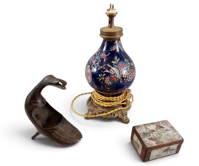 three different types of decorative items including a lamp, a box, and a bird