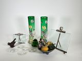 two vases and a picture frame on the table