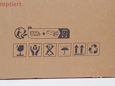 a cardboard box with a picture of a cat inside of it