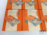 six boxes of garden kits sitting on top of a white table