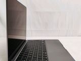 a laptop computer that is sitting on a table