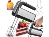 a person using a hand mixer to make a cake