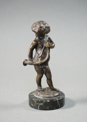 bronze figurine of a boy with a harp