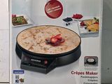 une boîte contenant un appareil à crêpes