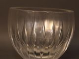 a glass bowl that is sitting on a table