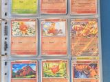 a close up of a binder with a bunch of cards on it