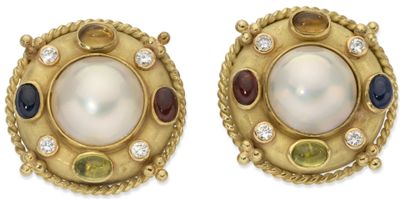an image of a pair of earrings with pearls and gems
