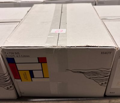 several boxes are stacked on top of each other on a table