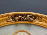 a picture of a gold frame with flowers on it
