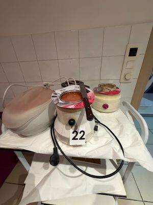 a table with a pot of soup and a bowl of soup on it
