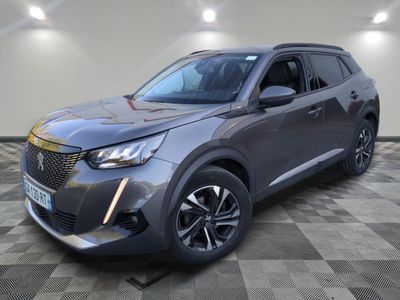 a grey suv parked in a room with a checkered floor
