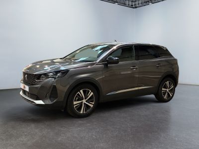 the grey car is parked in a white room with a black floor