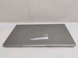 a laptop that is sitting on a white table