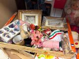 a wooden box filled with assorted items on a table