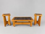 two tables and a coffee table with a mosaic tile top