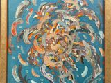 tableau représentant un tableau de poissons dans une eau bleue, avec un cadre doré