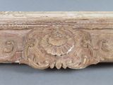 an old wooden frame with carvings and carvings on it