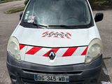 a white van with red stripes parked in a parking lot