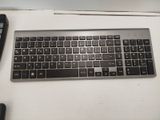 a keyboard and a mouse sitting on a desk