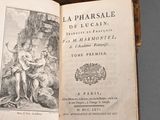 an open book with a picture of a woman and a child