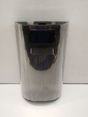 a close up of a silver vase on a table with a white background