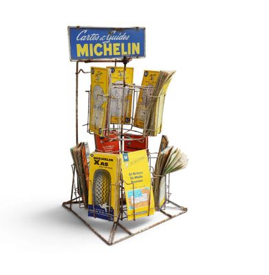 a stand with a bunch of books and a sign on it