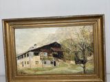 une peinture à l'huile représentant une grange et un arbre, dans un cadre doré