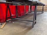 an image of a long table in a warehouse