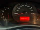 a close up of a speedometer on a car ' s dashboard
