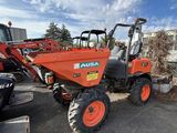 a tractor that is parked in a lot