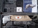 a box with tools in it sitting on a table