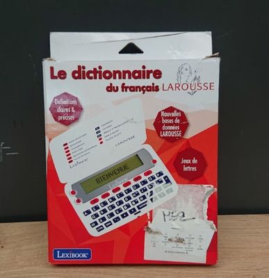 a box with a calculator in it on a table