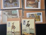 several cards with pictures of people and animals on them on a table