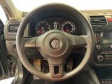 dashboard of a car with a steering wheel and dashboard gauges