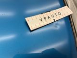 a sticker that says vauto on the side of a piece of luggage