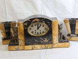 a clock that is sitting on top of a table