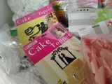 many different types of cake decor items on the counter