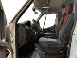 a white van with black seats and a steering wheel