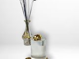 a vase with a bunch of flowers in it on a table