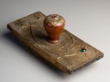 an image of a small wooden box with an owl on top of it