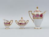 three pieces of porcelain tea and coffee set with gold trimming