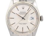 an image of a rolex watch with a white dial on a bracelet