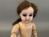 a doll that is sitting on a table