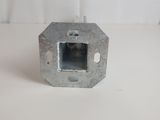 a small metal object that is on a white surface