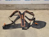 a pair of skis and a pair of shoes on the ground